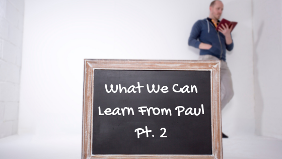 Post title What We Can Learn From Paul Pt. 2 on chalkboard and man standing in background holding Bible