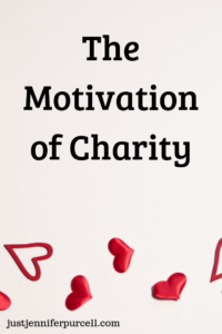 The Motivation of Charity on background with hearts